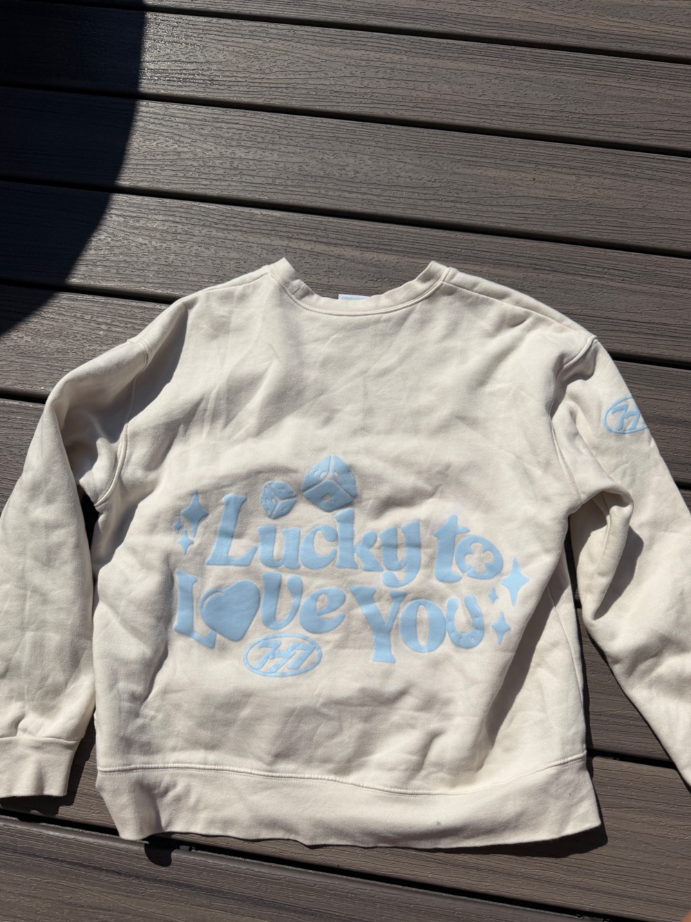 Cream Crewneck Sweatshirt with Light Blue 'Lucky to Love You' Graphic